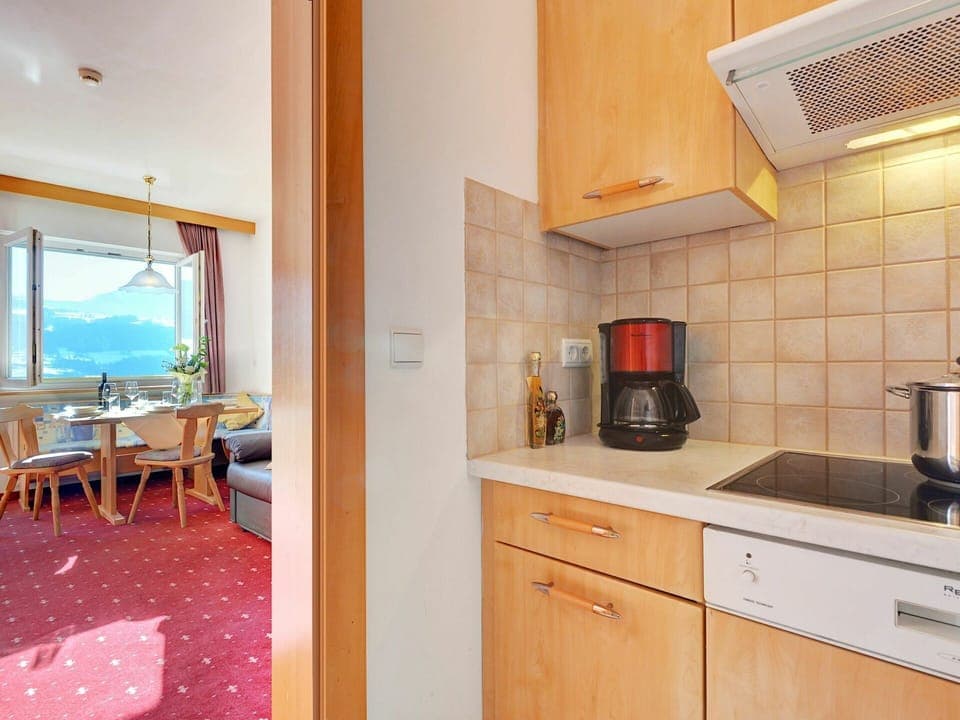 Building, Cabinetry, Countertop, Furniture, Kitchen Appliance, Kitchen, Wood, Kitchen Stove, Drawer, Window