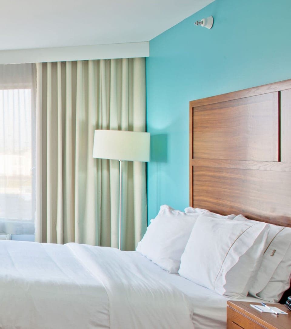 Premium bedding, desk, blackout drapes, iron/ironing board