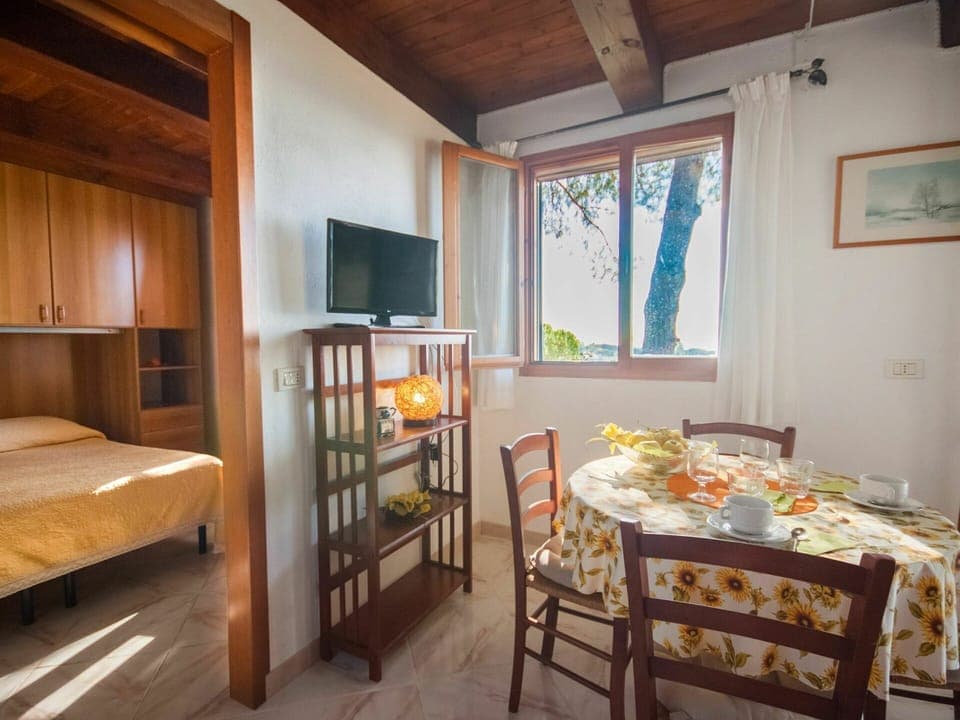 Furniture, Property, Wood, Interior Design, Table, Comfort, Cabinetry, Window, Chair, Floor