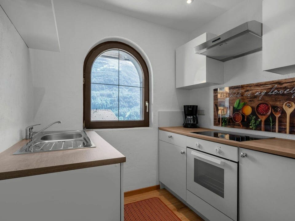 Cabinetry, Kitchen Sink, Window, Sink, Kitchen Appliance, Countertop, Kitchen Stove, Wood, Kitchen, Home Appliance