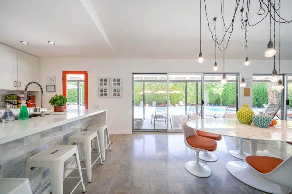 The kitchen and dining area have direct access to the pool and BBQ.