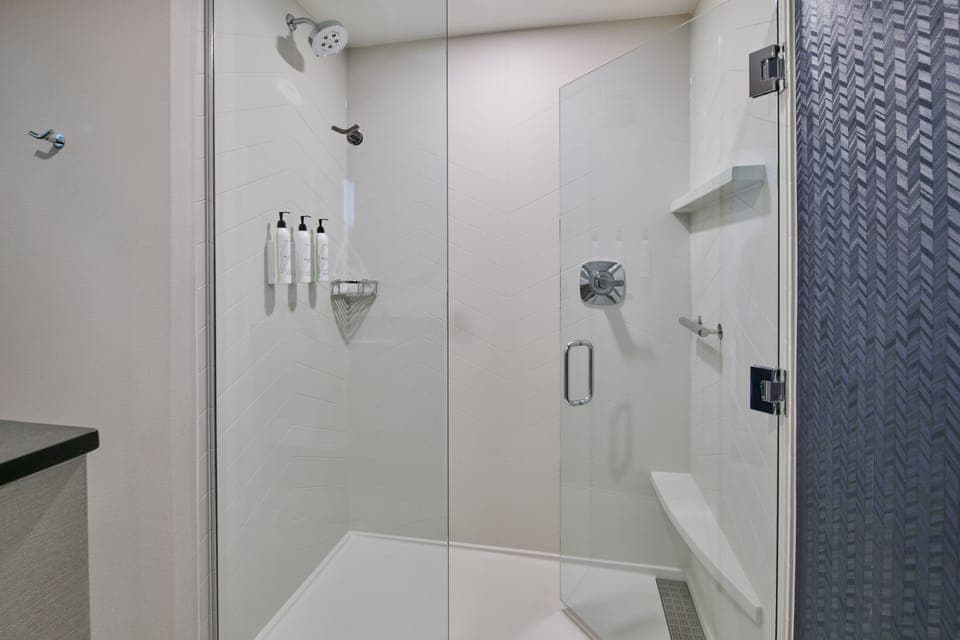 Rainfall showerhead, free toiletries, hair dryer, towels