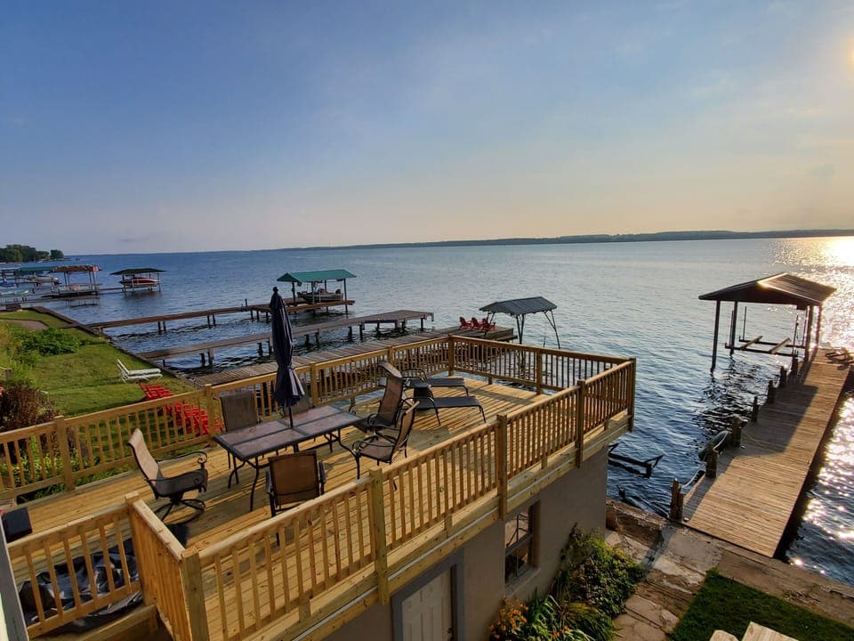 Brand new beautiful upperboat house deck with grill and lots of seating 