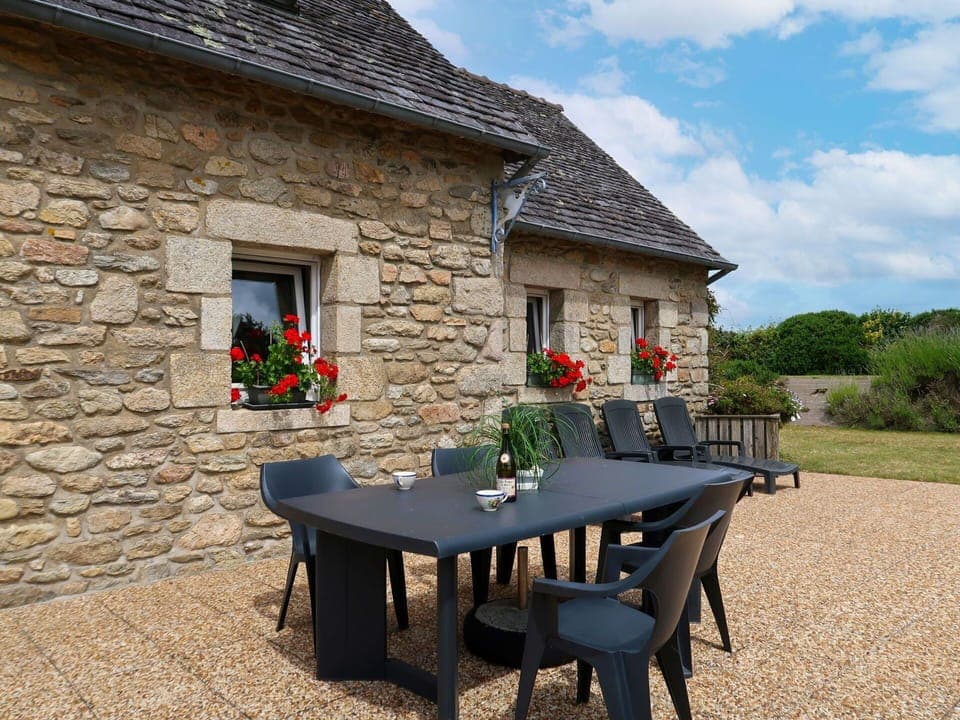 Flower, Sky, Plant, Furniture, Property, Window, Cloud, Table, Building, Chair