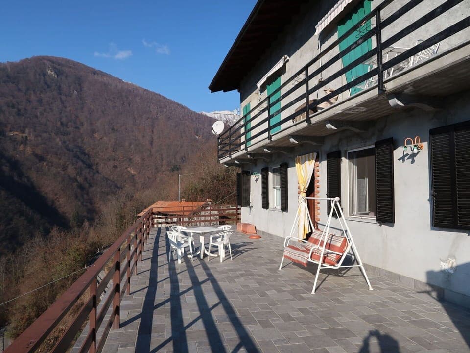 Sky, Cloud, Slope, Wood, Window, Building, Shade, Composite Material, Landscape, Facade