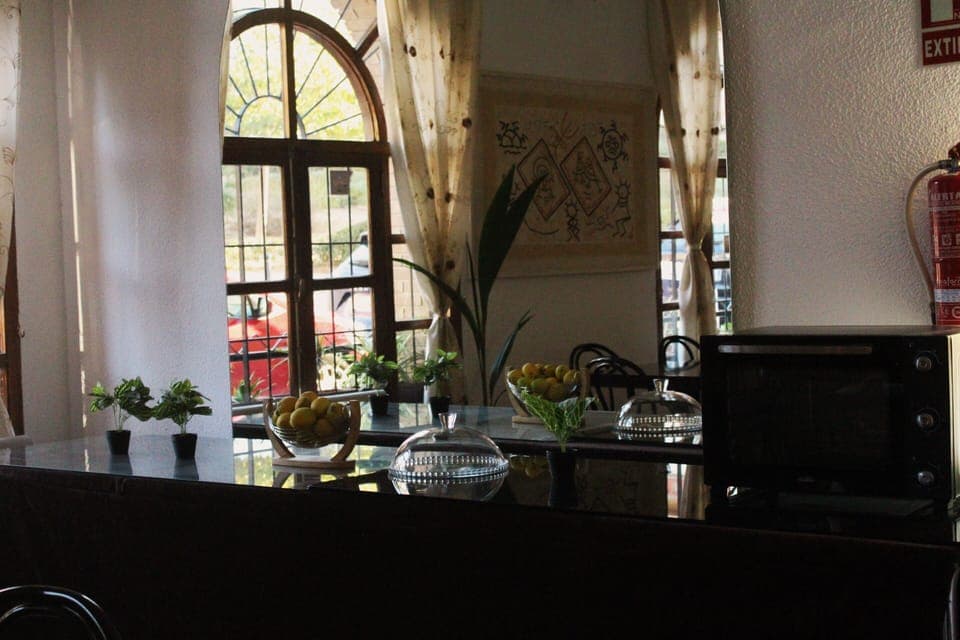 32-inch flat-screen TV with cable channels, printers