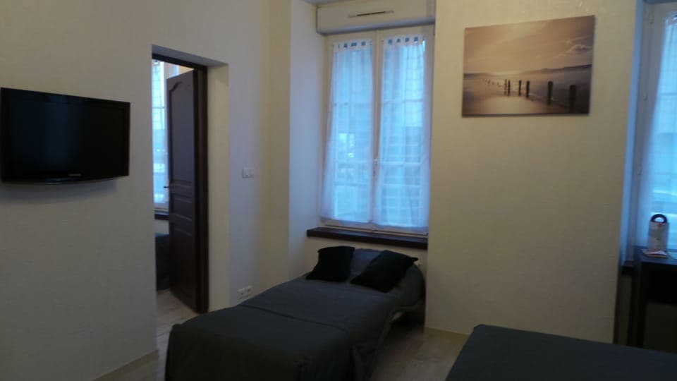 Family Room | Premium bedding, individually decorated, individually furnished, desk