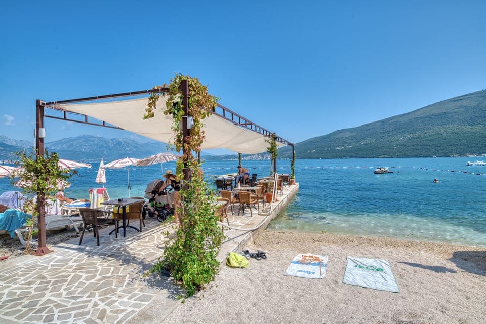 Private beach nearby, white sand, beach cabanas, beach bar