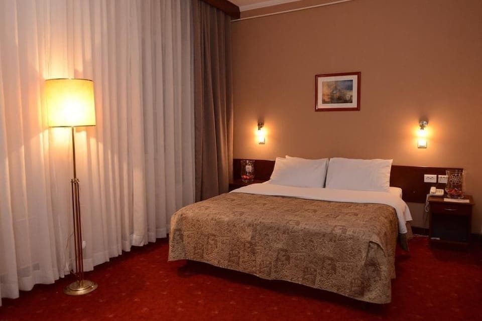 Premium bedding, blackout drapes, iron/ironing board, free WiFi