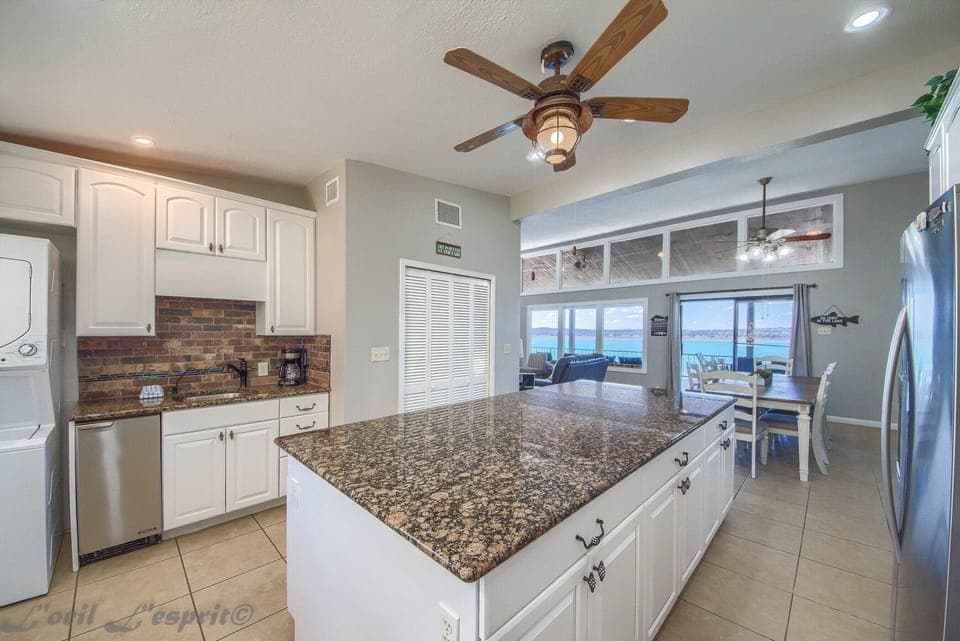Kitchen has a standard drip coffee maker.
