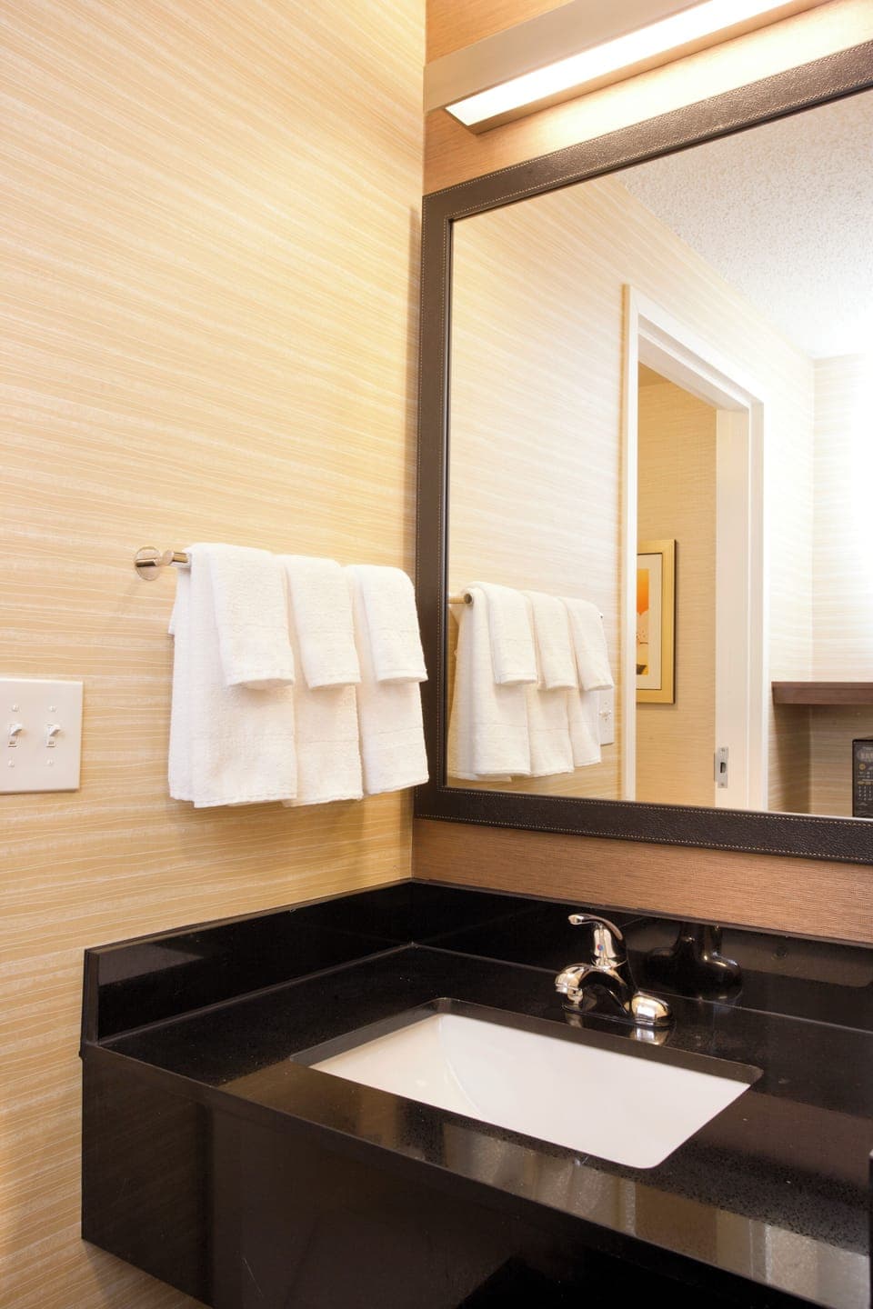 Combined shower/tub, designer toiletries, hair dryer, towels