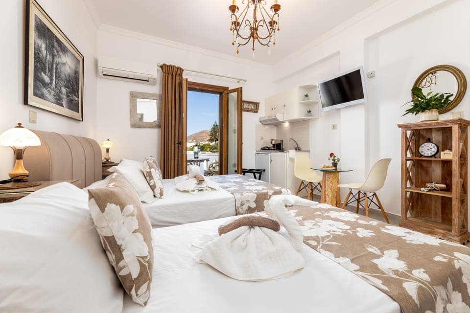 Studio for 3 people | Premium bedding, down comforters, memory foam beds, in-room safe