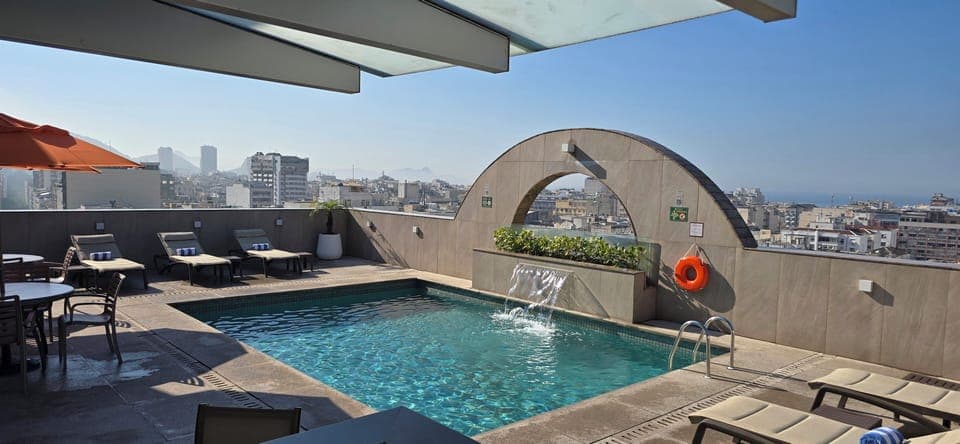 Outdoor pool, pool umbrellas, sun loungers