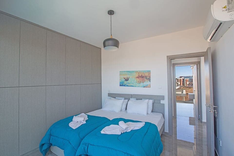 Bedroom 2 with two single beds