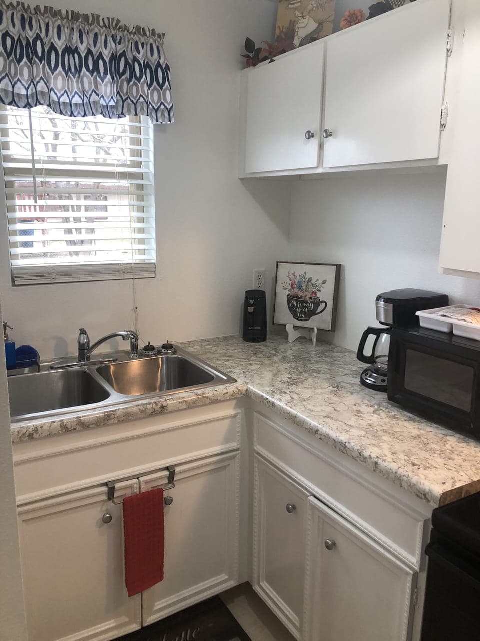 Kitchen for your cooking needs. Coffee pot, microwave, can opener, crockpot.