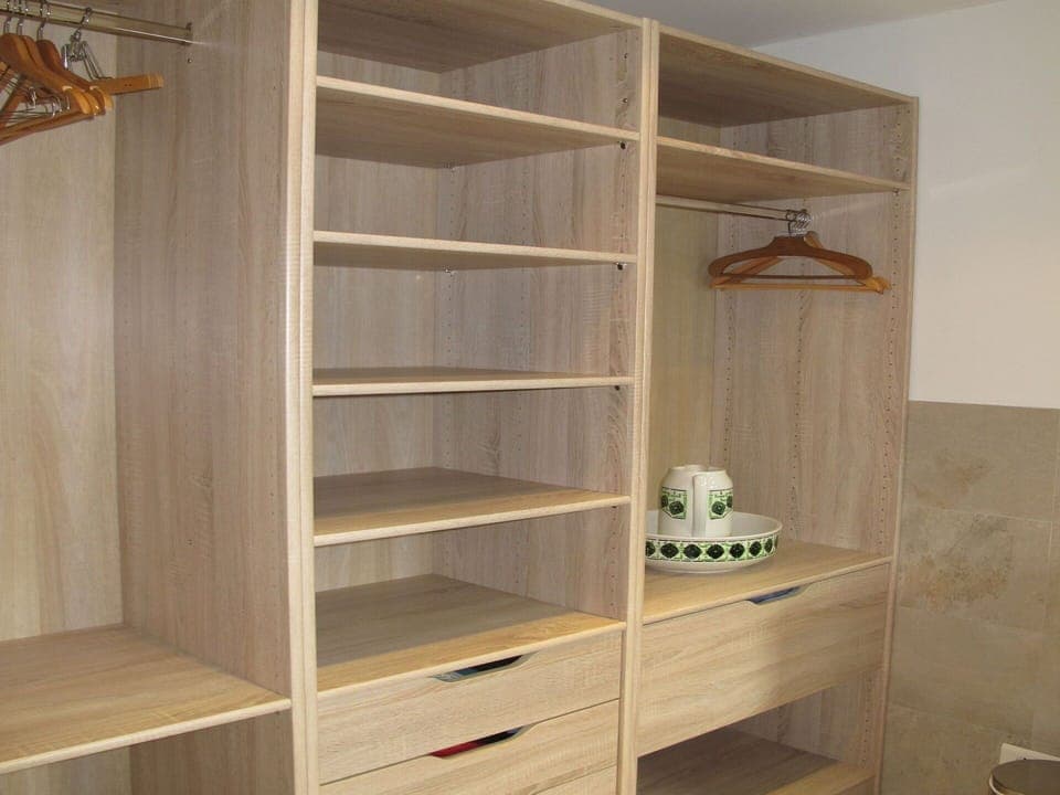Furniture, Shelf, Shelving, Wood, Lighting, Floor, Cabinetry, Wood Stain, Wall, Hardwood