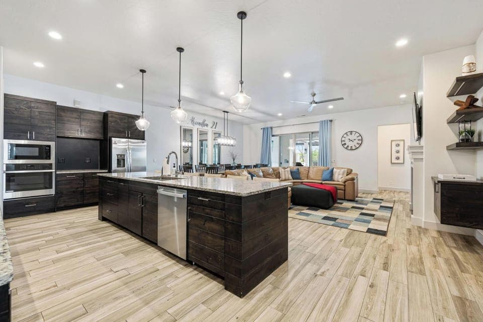 Spacious main floor living area with kitchen, living, and dining rooms all together