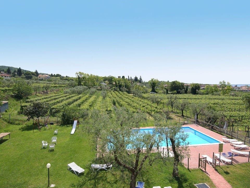 Sky, Water, Plant, Natural Landscape, Tree, Swimming Pool, Land Lot, Urban Design, Grass, Landscape