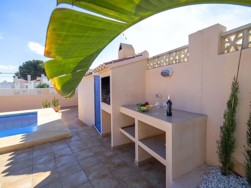 Floor, Flooring, Furniture, Swimming Pool, Outdoor Furniture, Flowerpot, Shade, Concrete, Chair, Houseplant