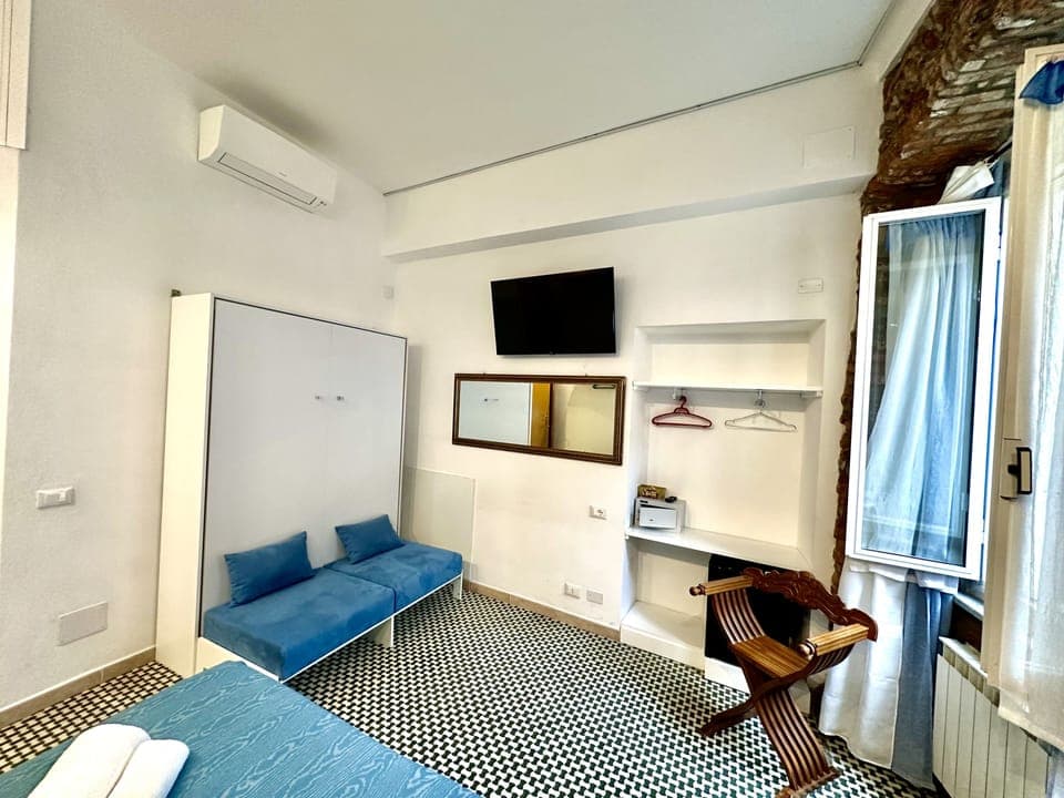 Premium Quadruple Room | In-room safe, free WiFi, bed sheets