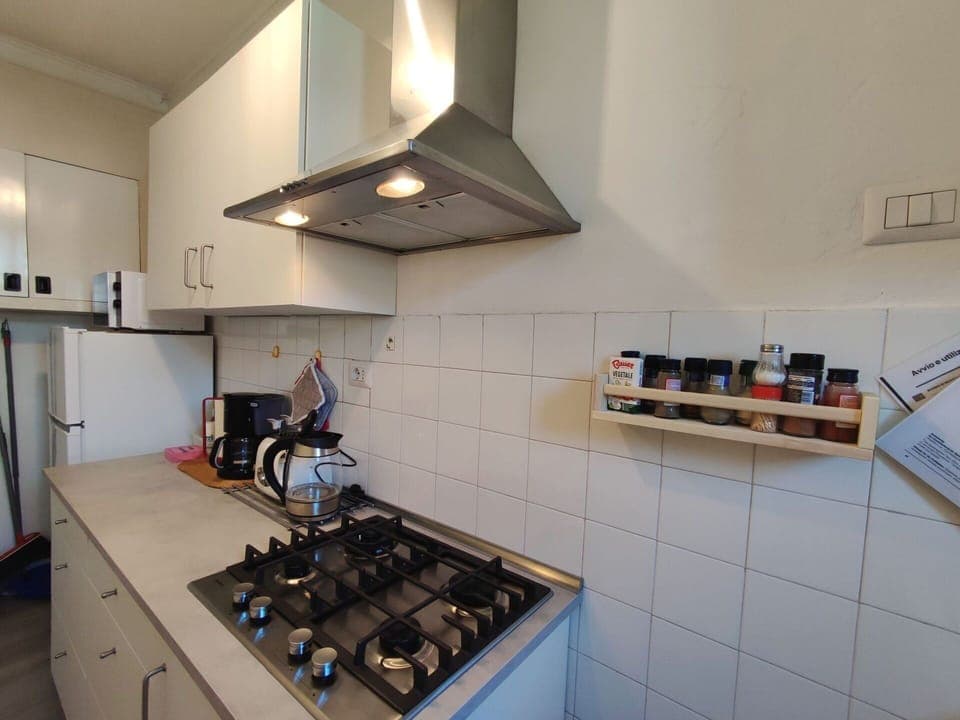 Countertop, Cabinetry, Gas Stove, Kitchen Stove, Cooktop, Kitchen Appliance, Kitchen, Wood, Exhaust Hood, Stove