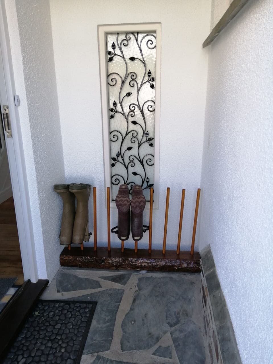 Front porch with boot/shoe rack