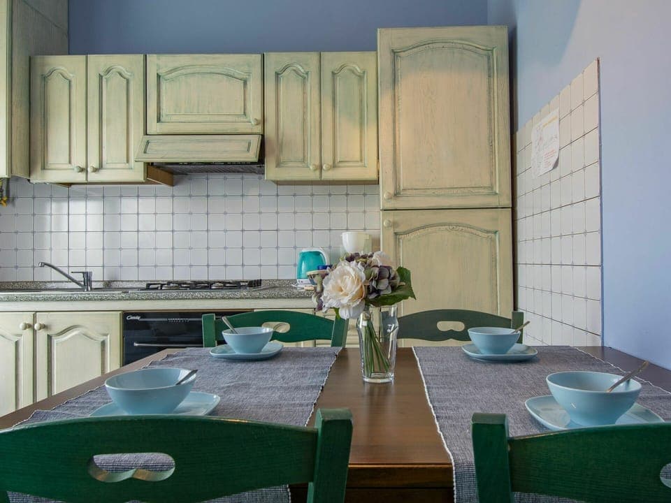 Table, Furniture, Property, Tableware, Cabinetry, Countertop, Green, Azure, Kitchen, Dishware