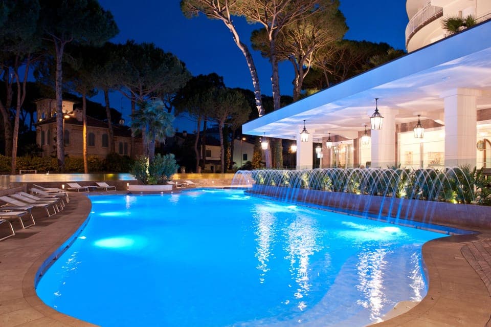 Indoor pool, outdoor pool, pool umbrellas, sun loungers