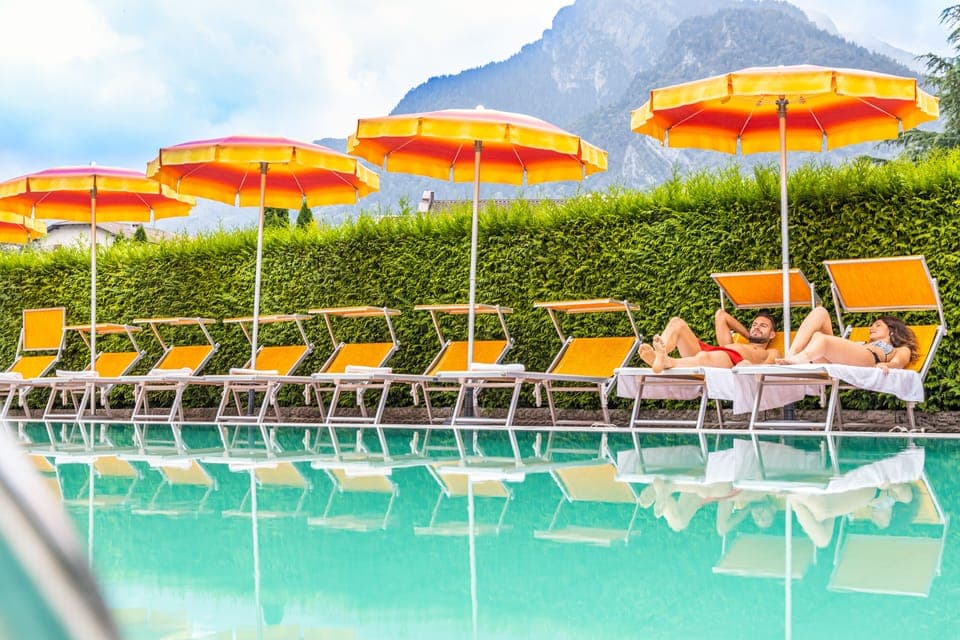 Outdoor pool, open 9:00 AM to 6:30 PM, pool umbrellas, sun loungers