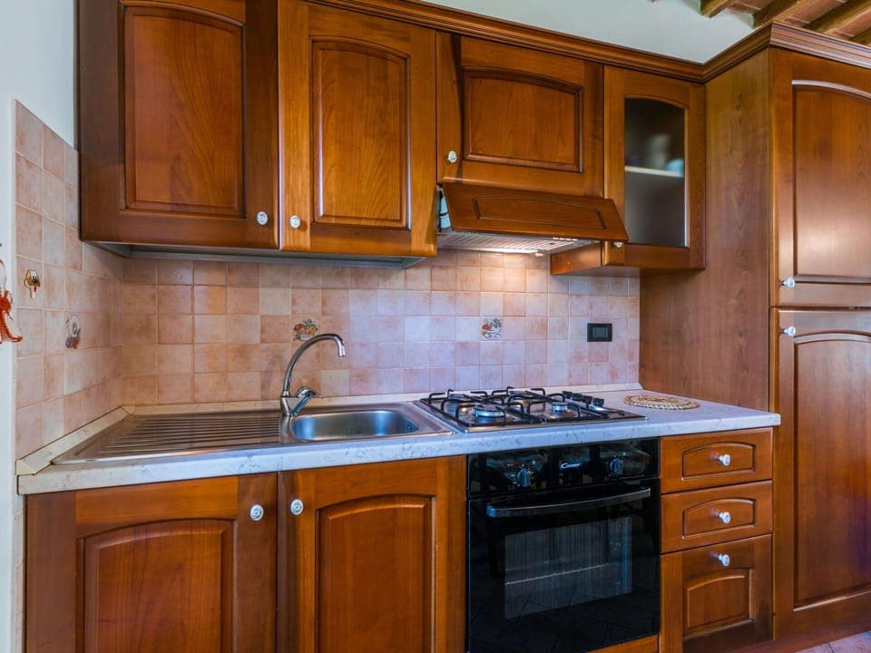 Kitchen, Major Appliance, Wood, Countertop, Cabinetry, Kitchen Appliance, Interior Design, Flooring, Kitchen Stove, Home