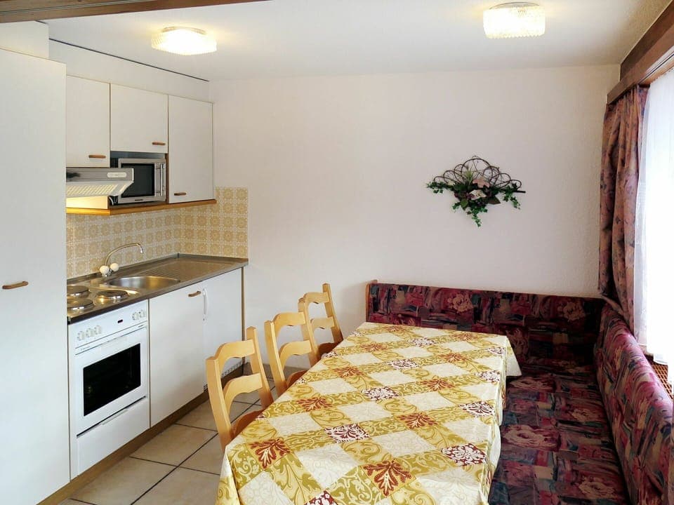 Furniture, Property, Cabinetry, Building, Countertop, Wood, Interior Design, Drawer, Kitchen Stove, Kitchen Appliance