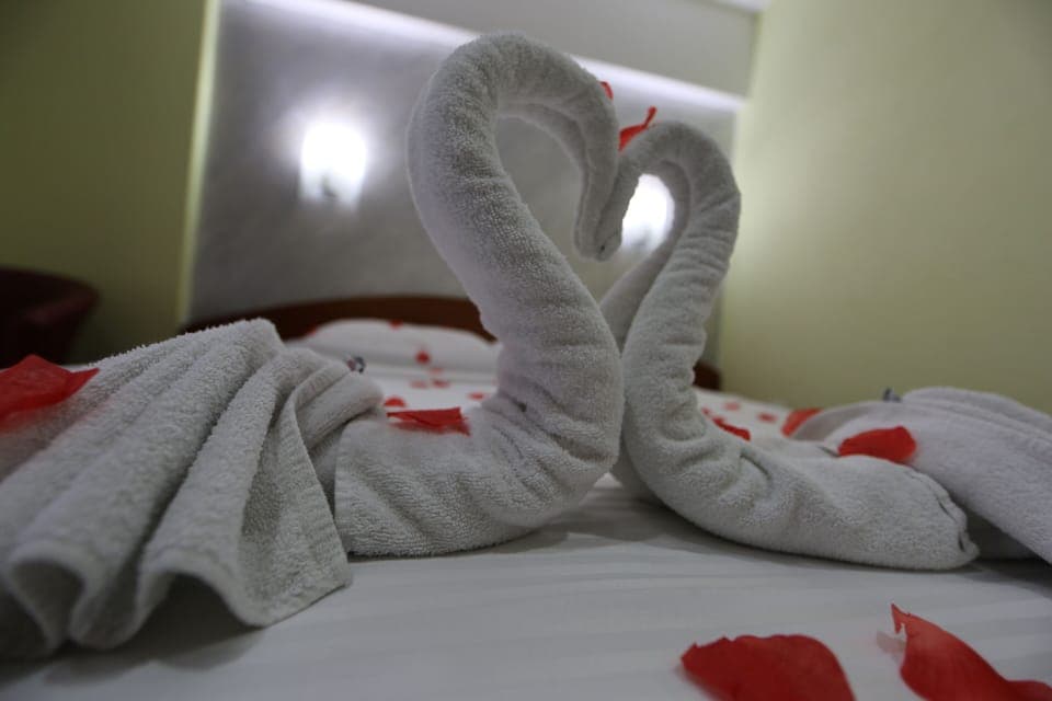 Desk, blackout drapes, soundproofing, free cribs/infant beds