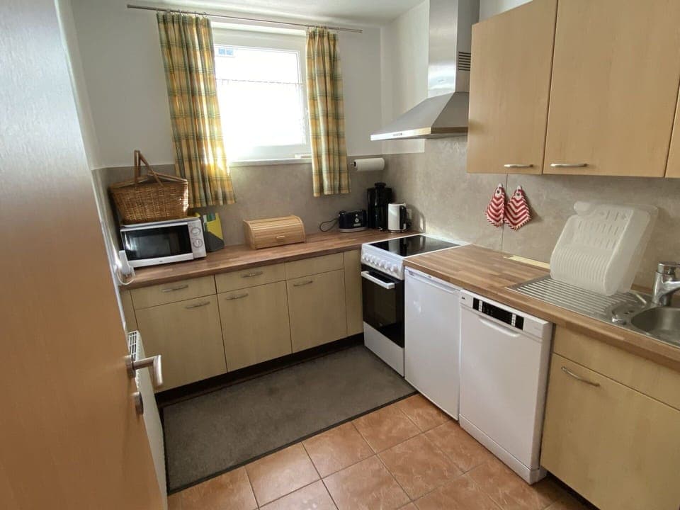 Cabinetry, Kitchen Sink, Countertop, Furniture, Window, Kitchen Appliance, Kitchen Stove, Home Appliance, Kitchen, Sink