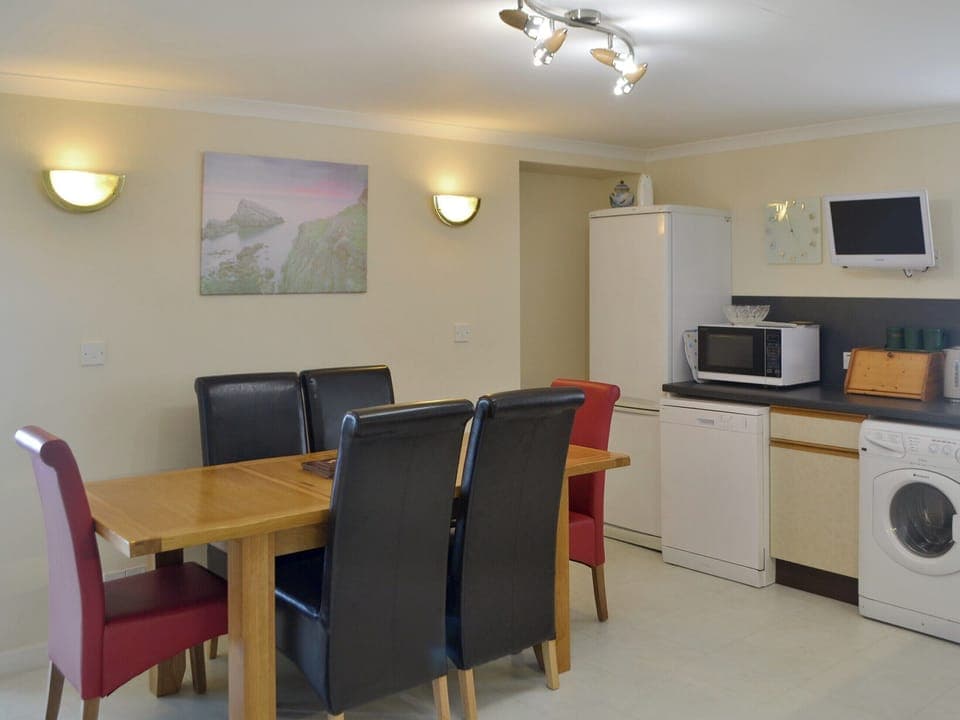 Convenient dining area within the kitchen/diner | Seabreezes - Scott Holiday Cottages, Portknockie