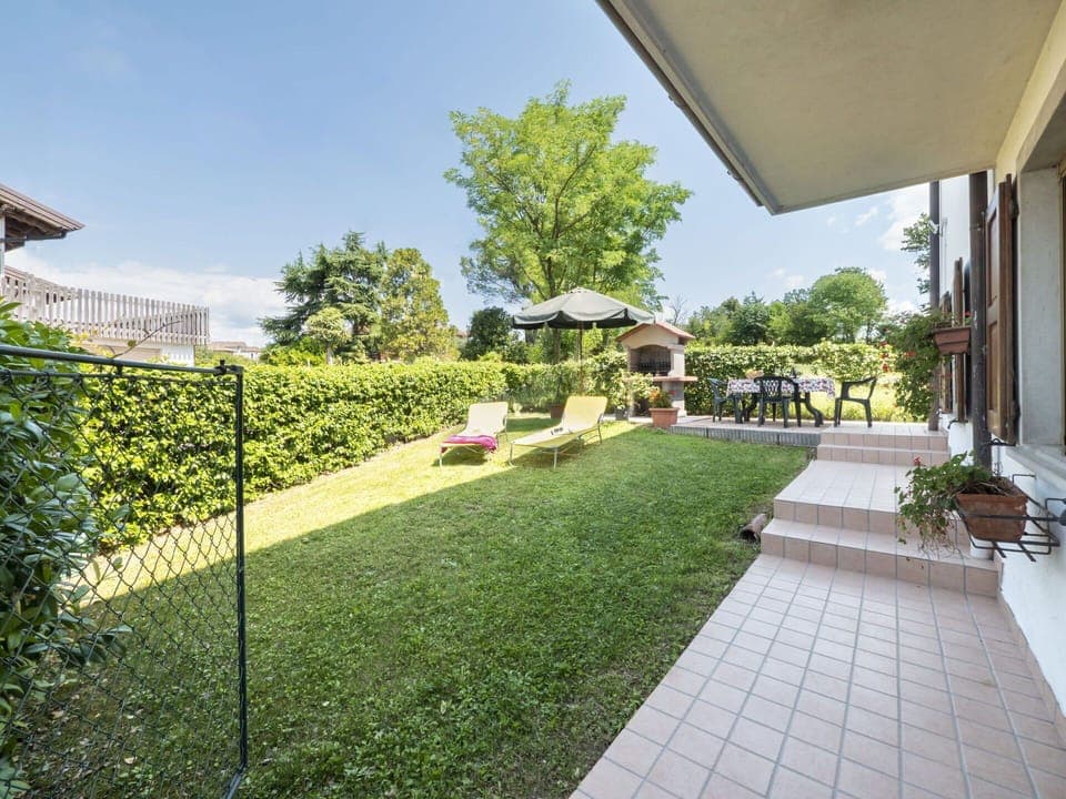 Plant, Sky, Property, Tree, Flowerpot, Shade, Urban Design, Road Surface, Building, Grass