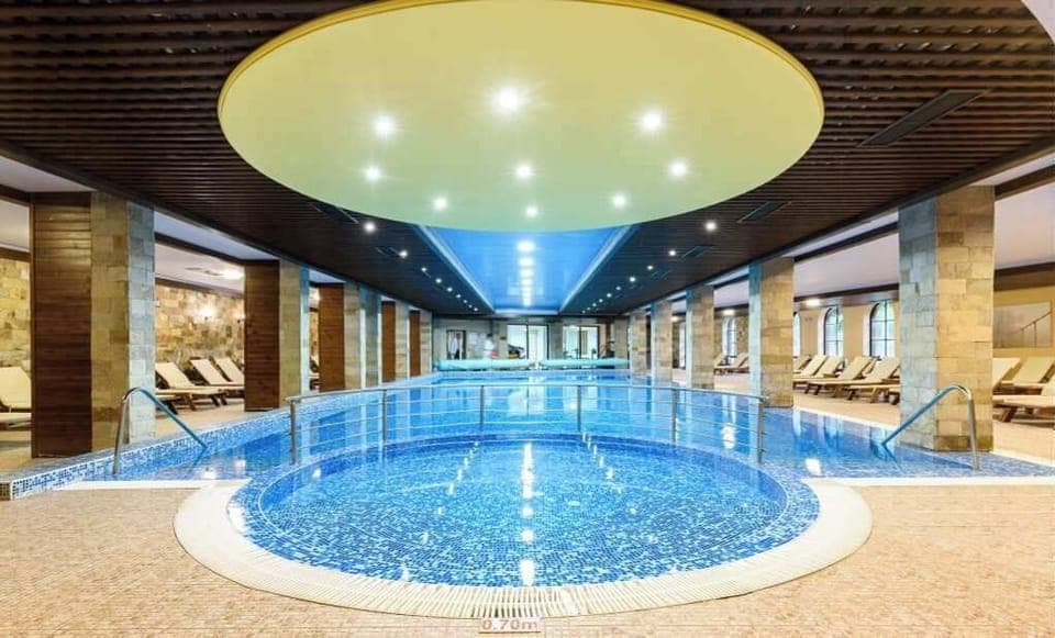 Indoor pool, open 9:00 AM to 8:00 PM, sun loungers, lifeguards on site