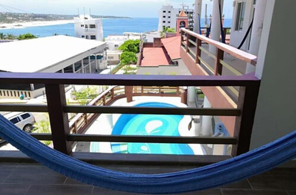 Diamante.Suite premium, Cama King Size +Mini cocineta, Terraza, Vista al mar y piscina, De no fumar | Terrace/patio