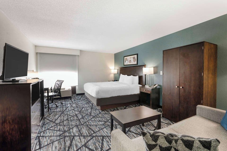 Desk, blackout drapes, soundproofing, iron/ironing board