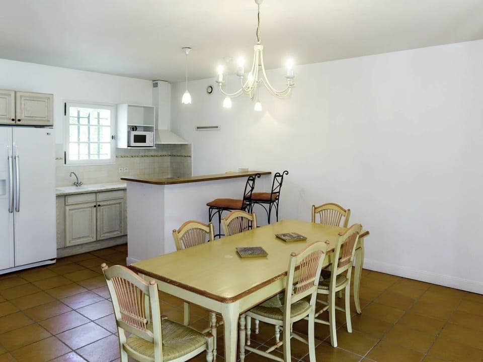 Furniture, Cabinetry, Property, Table, Chair, Countertop, Wood, Lighting, Interior Design, Kitchen & Dining Room Table