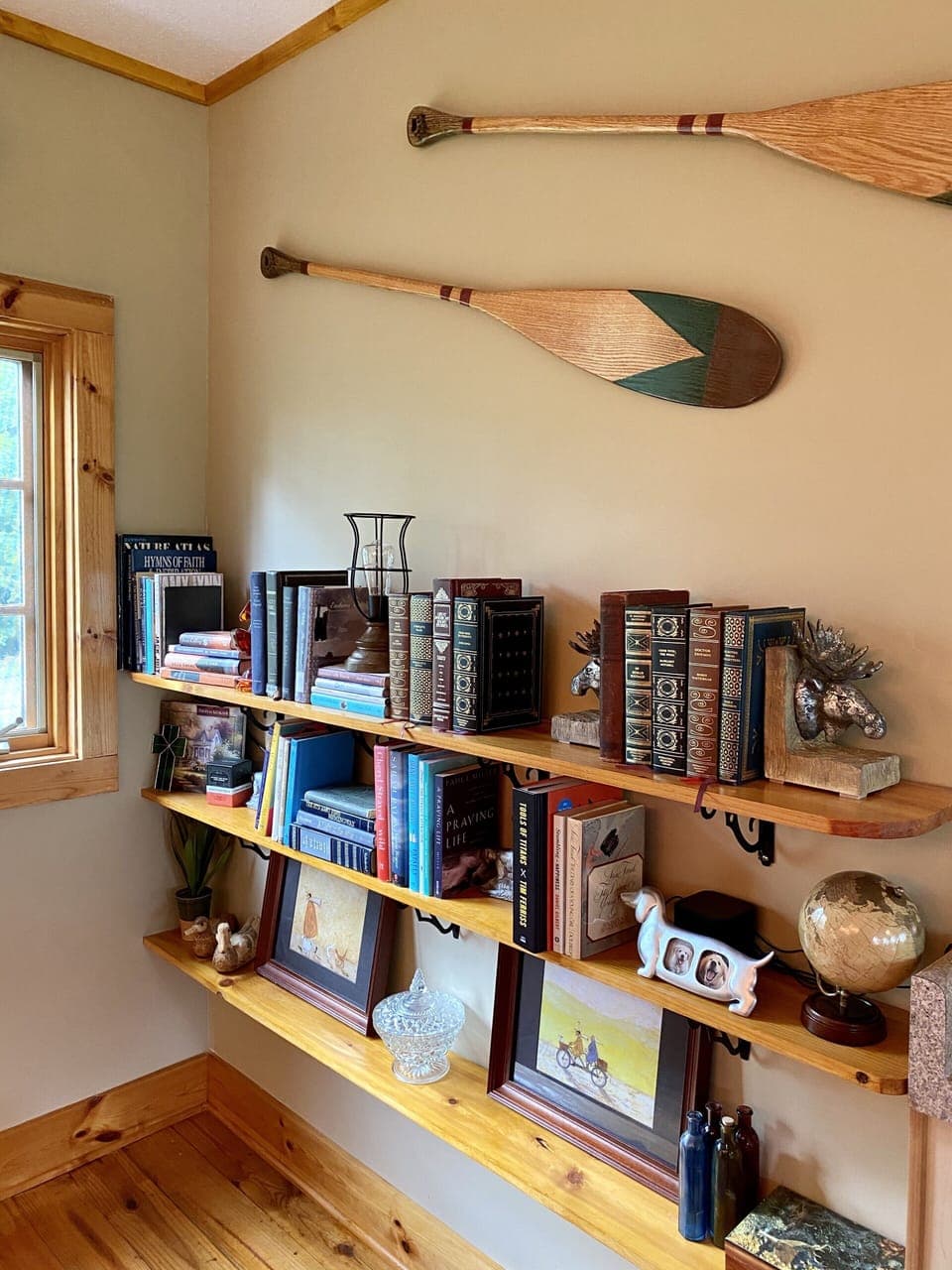 Upper level seating area  with a selection of books for reading