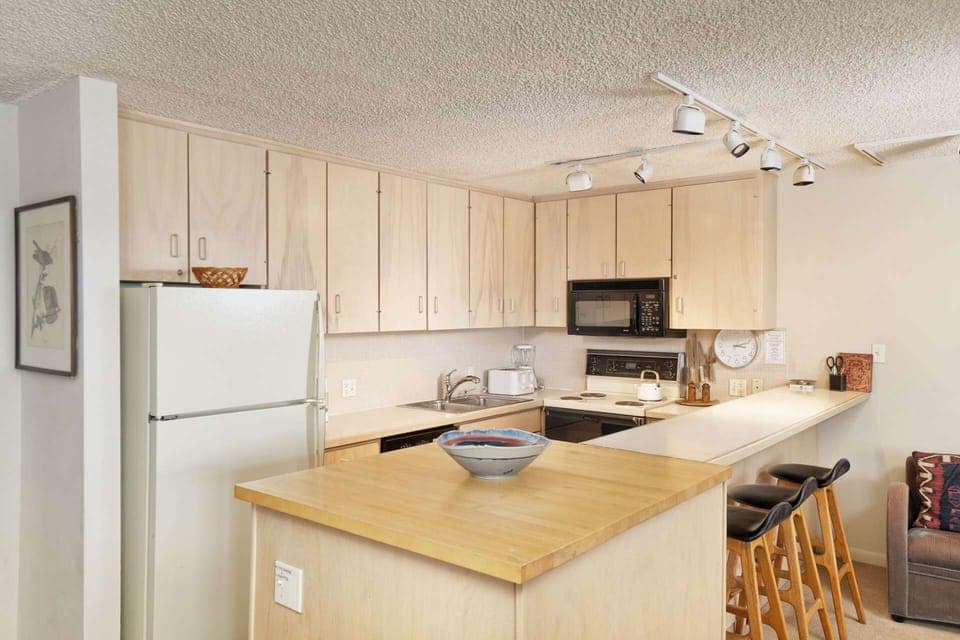 The kitchen is full stocked and the island is a great place to gather and share stories of your day's adventures!