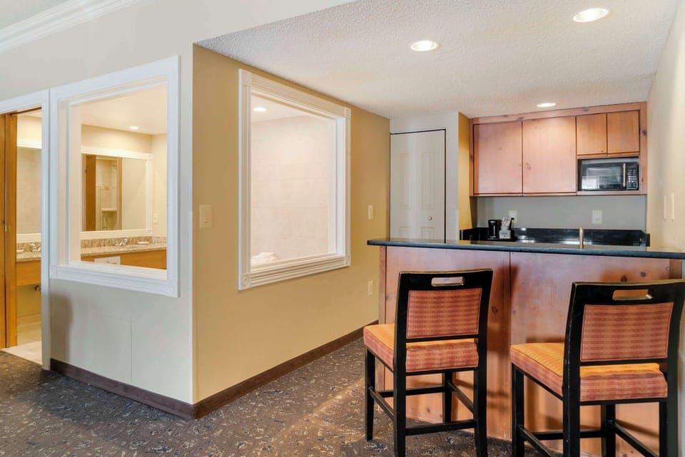 Suite, 2 Queen Beds, Non Smoking, Jetted Tub | In-room safe, desk, laptop workspace, blackout drapes