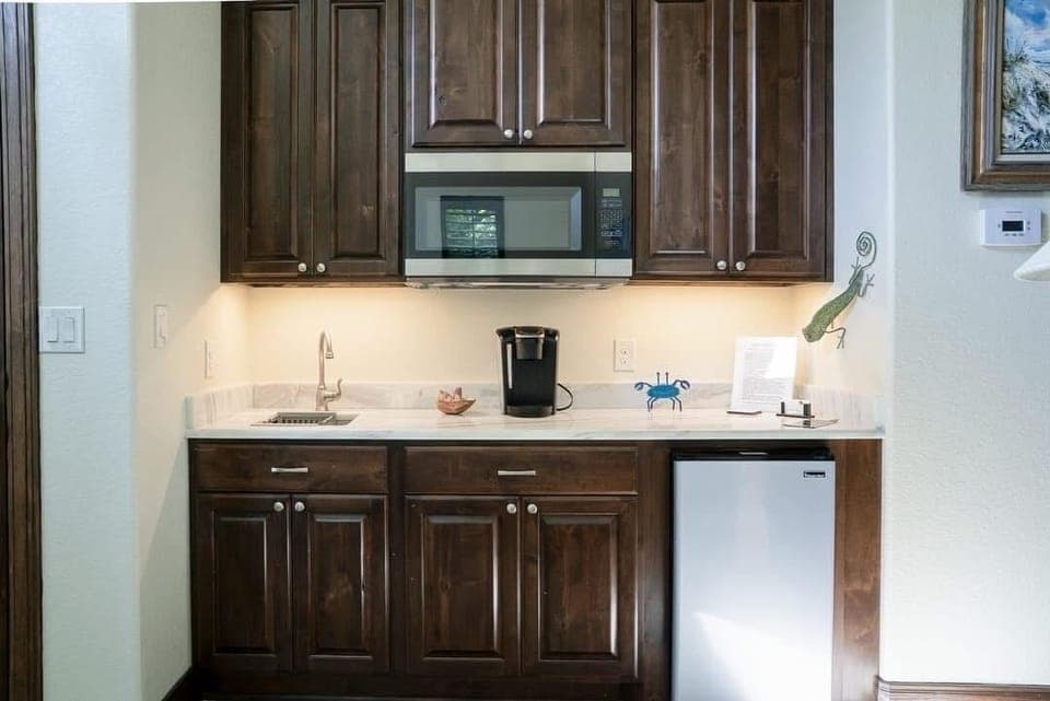 Our kitchenette has a sink , microwave, coffee maker and mini fridge