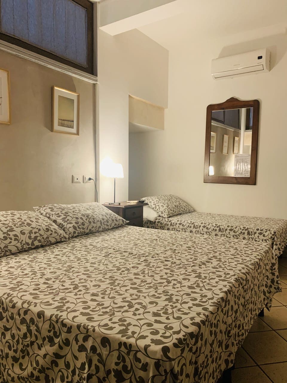 Triple Room | Desk, blackout drapes, iron/ironing board, cribs/infant beds