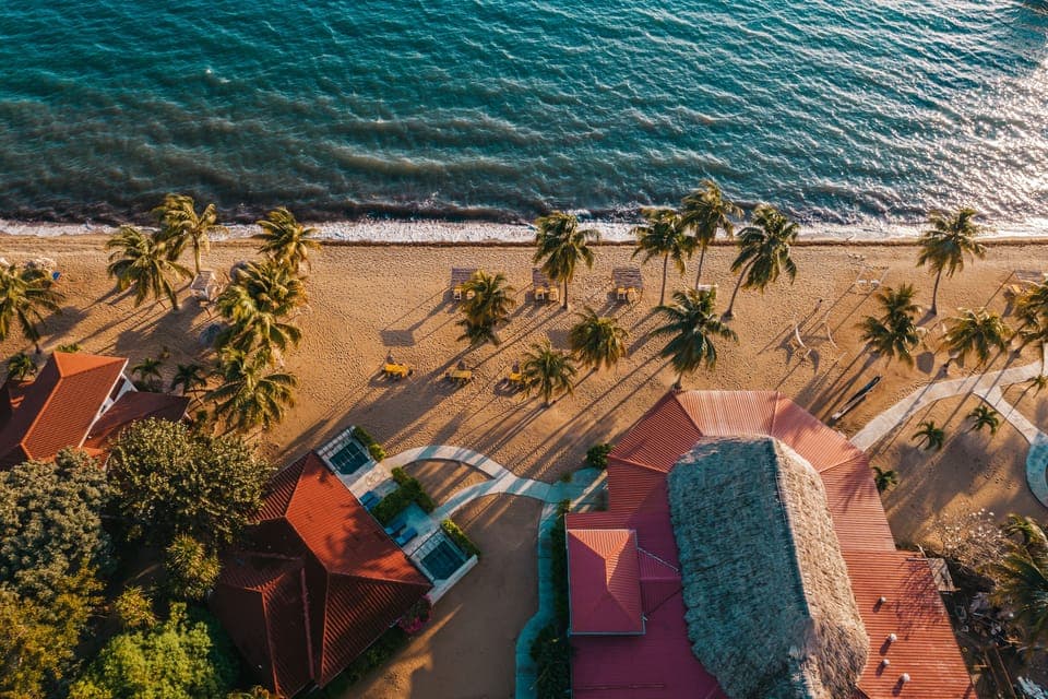 On the beach, white sand, beach towels, beach massages
