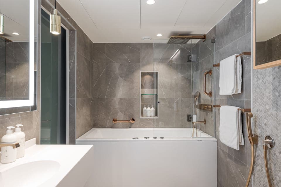 Suite, 1 King Bed (extra bed possibility) | Bathroom | Free toiletries, hair dryer, bidet, towels