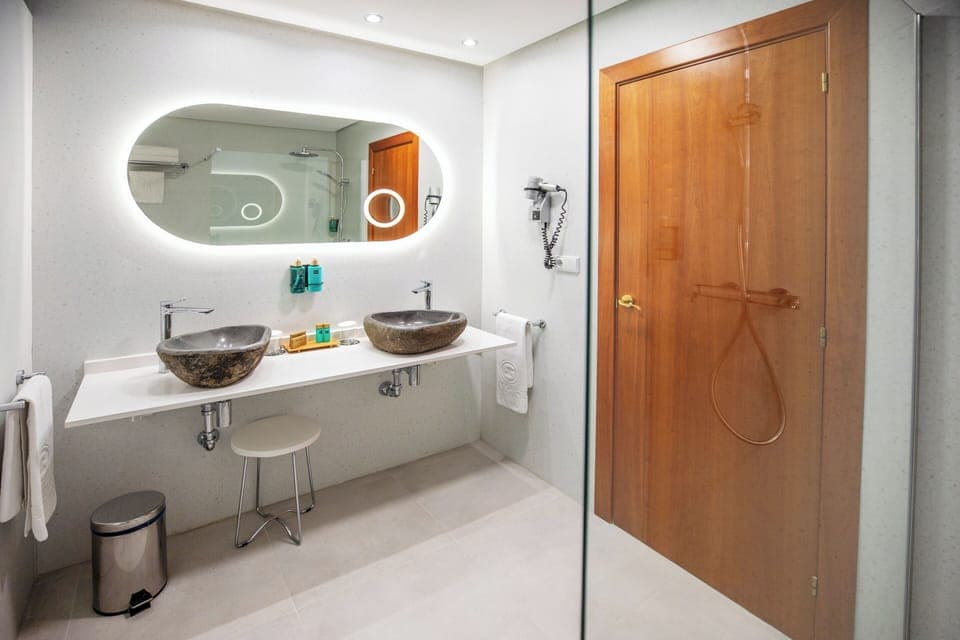 Hair dryer, towels, soap, shampoo