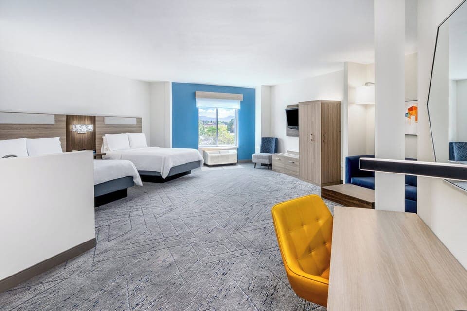 Suite, 2 Queen Beds | In-room safe, blackout drapes, iron/ironing board