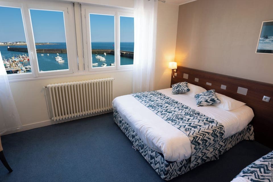 Quadruple Room, Ocean View | Desk, laptop workspace, iron/ironing board, free WiFi