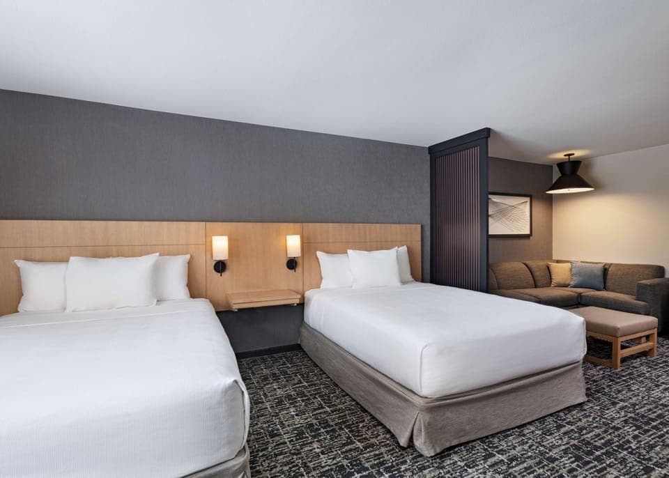 Down comforters, pillowtop beds, in-room safe, desk